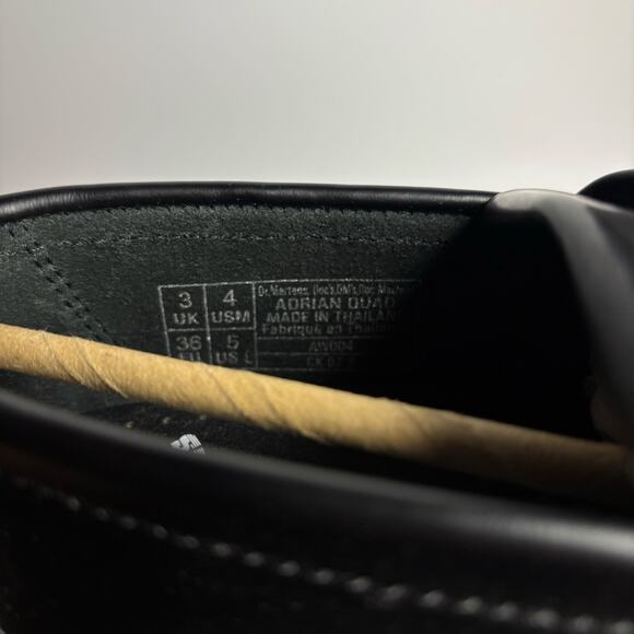 Dr. Martens Adrian Platform Tassel Loafers in Black Smooth Leather